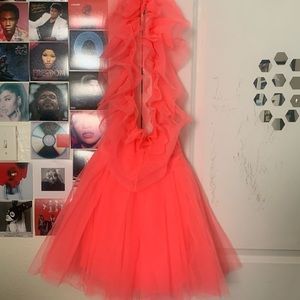 This is a hot pink dress from Fashion Nova.